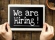 Words we are hiring written on chalkboard