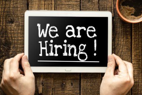 Words we are hiring written on chalkboard