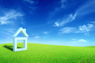 white paper home on grassy field white paper home in grass