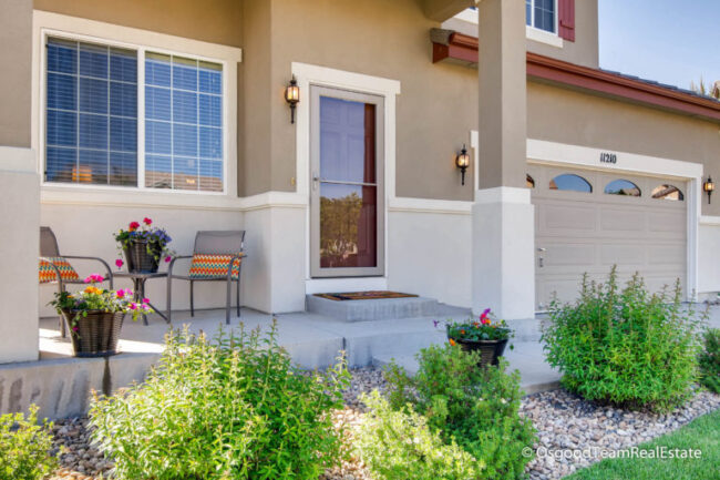 fun front porch with bistro table and 2 chairs