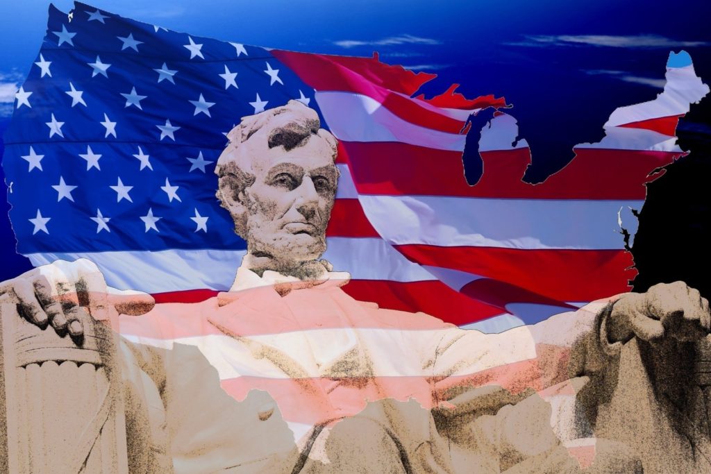 A tribute to Abraham Lincoln with American flag in background and the USA.