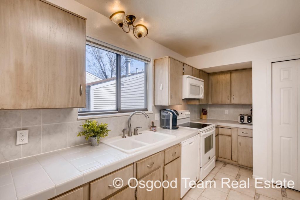 This kitchen is bright and and has a new dishwasher!