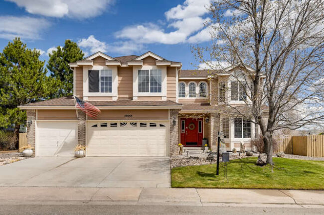 front elevation of home in clarke farms neighborhood 3 car garage/traditional