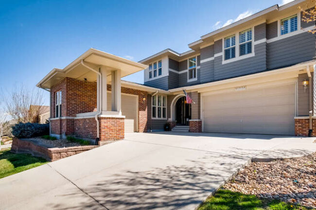 front photo of home in idyllwilde neighborhood with 3 car split garage