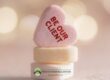 stacked candy hearts that say be our client