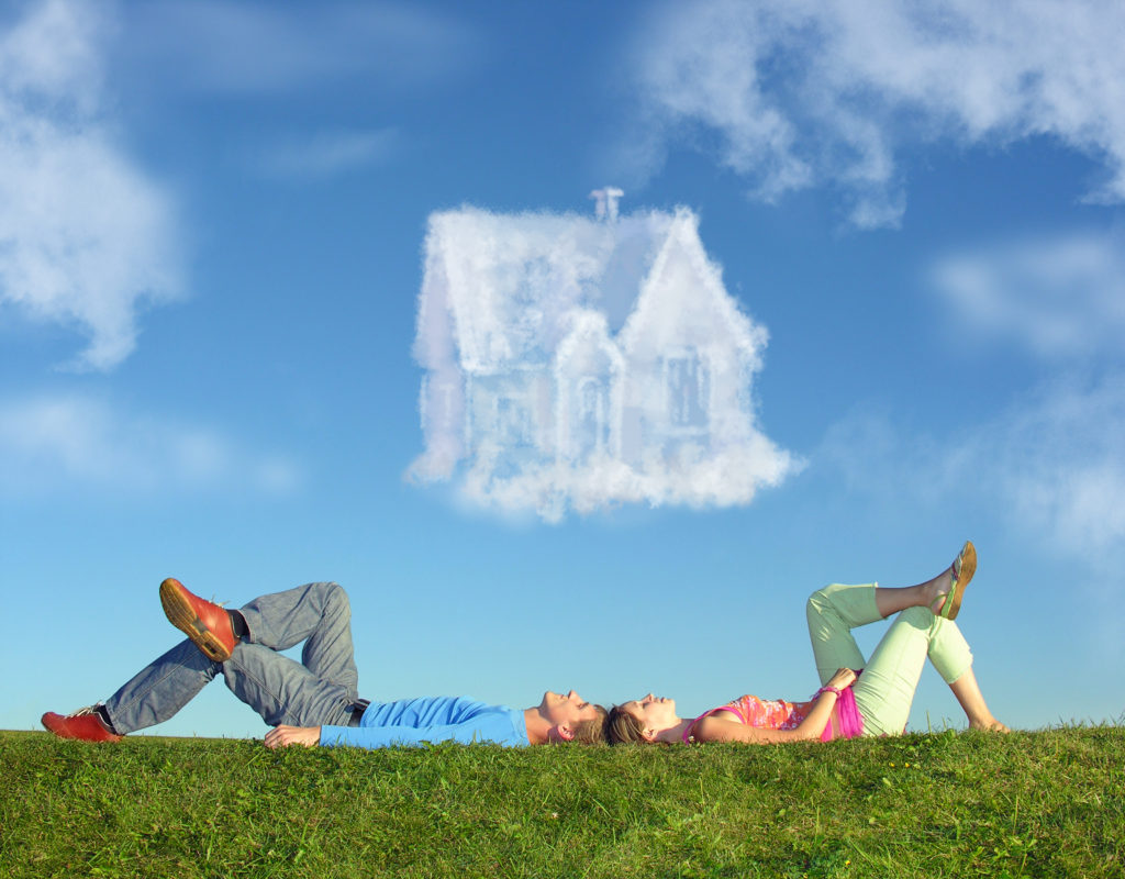 lying couple on grass and dream house collage