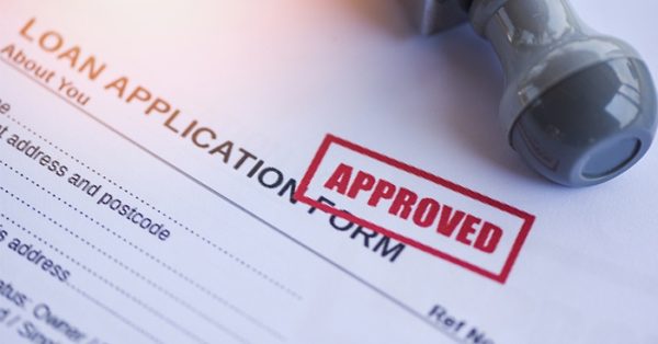 loan application form with approved across top