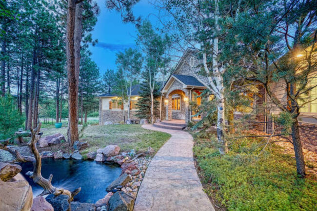 1384 Cinnamon Rd Larkspur CO-small-007-053-Exterior Front Walkway-666×444-72dpi stunning home in the trees on acreage in larkspur colorado