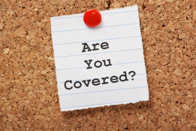 Insurance_Are you covered Are you covered post it note on corkboard