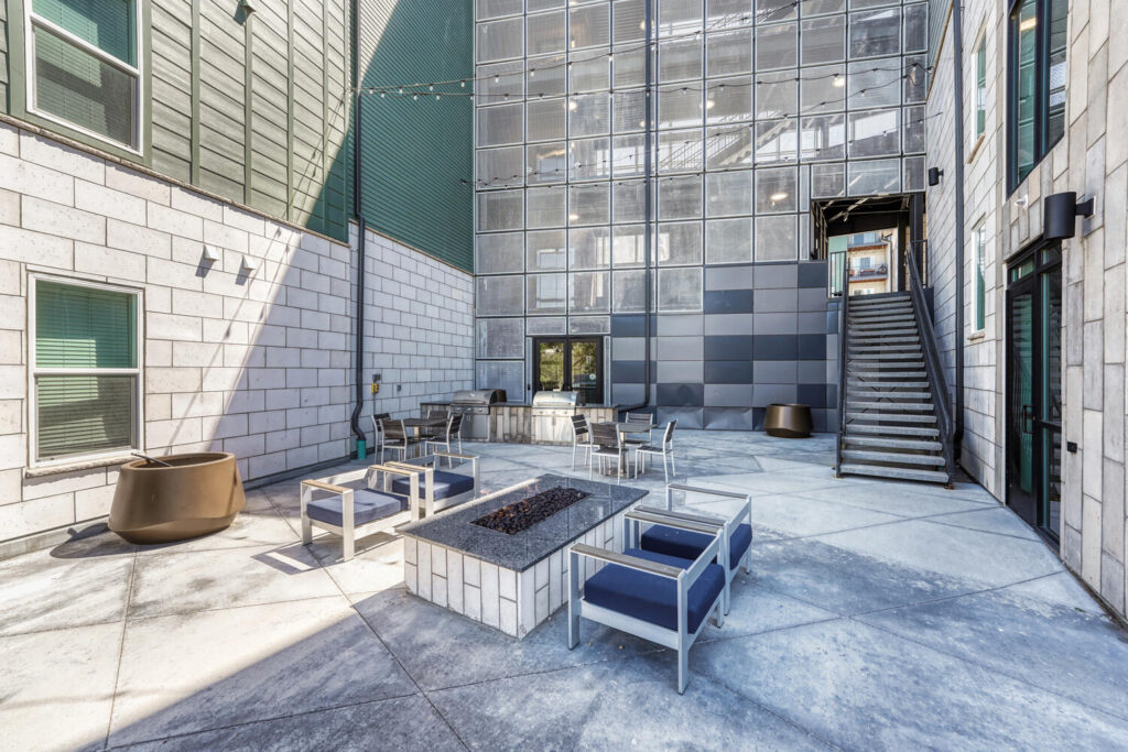 outdoor fire pit and grills area trails at westcreek condos