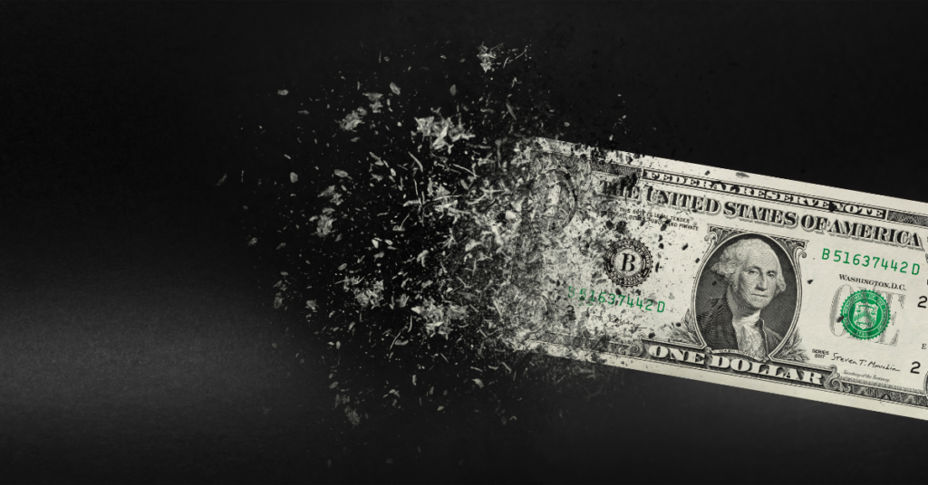 cash and a dollar bill burning