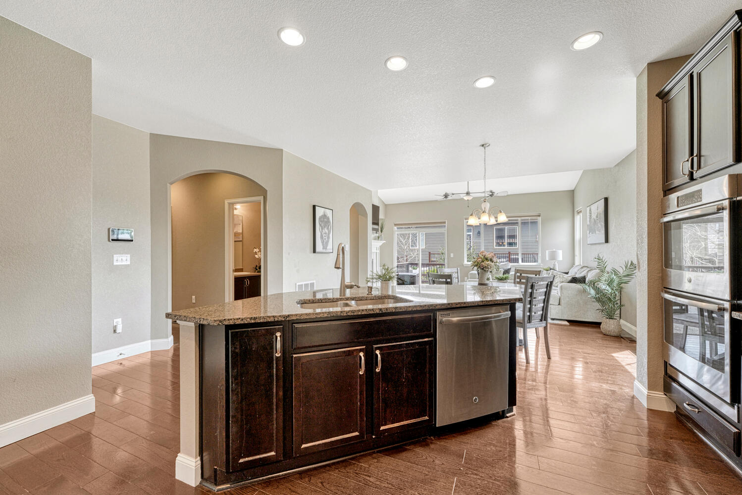 large center island tobacco colored cabinets