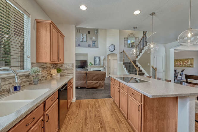 chefs kitchen with gas cooktop on center island
