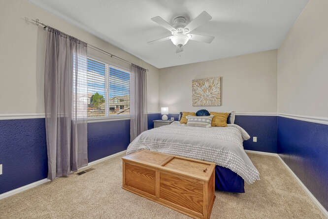 bedroom with chair rail