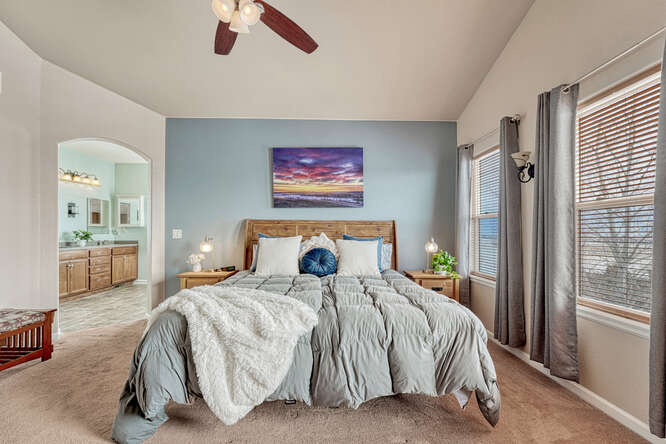 primary bedroom with nice sized windows for tons of light