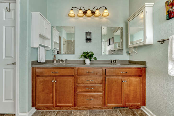 primary ensuite with double sinks in acreage home for sale in parker colorado