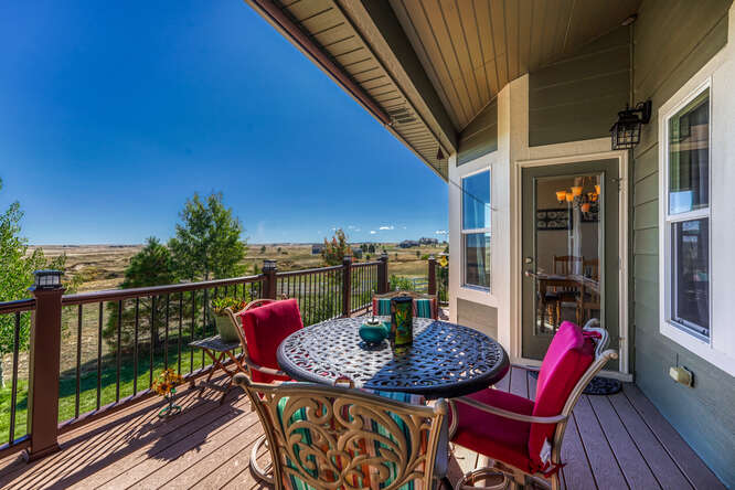 covered patio on ranch floor plan home on acreage in parker colo
