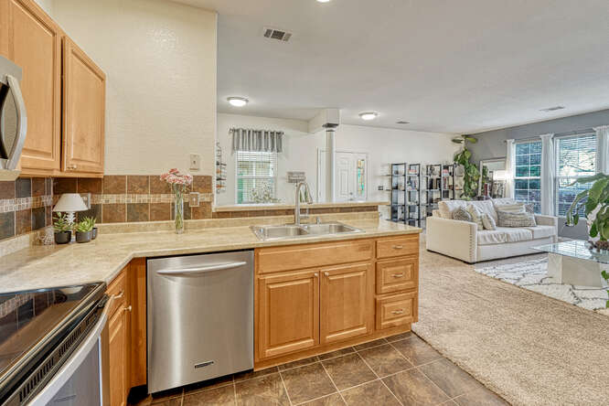 L shaped kitchen open concept to family room in aurora co condo