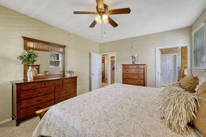 large primary bedroom with ensuite in englewood colorado townhome for sale