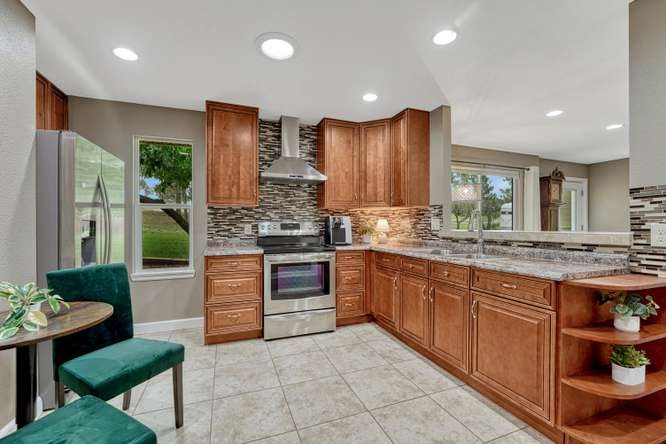 In-Law quarters full kitchen with backspash and hood